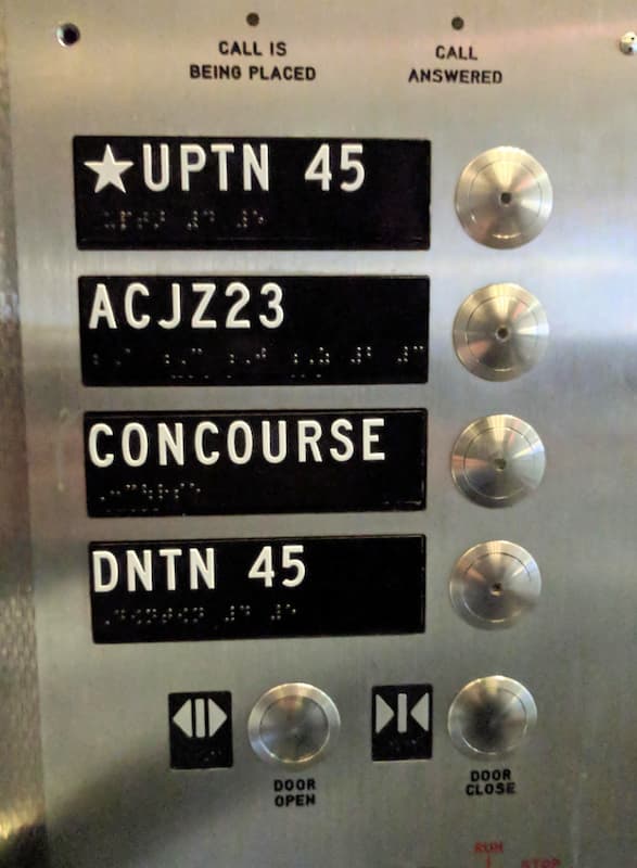 Various buttons in the subway elevator