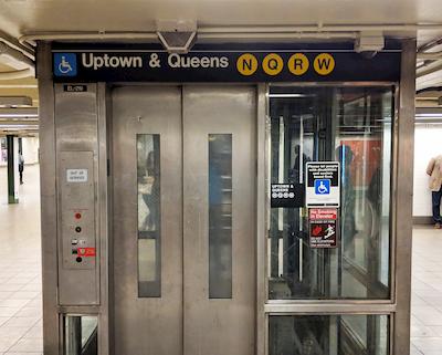Elevator to the Uptown/Queens-bound N/Q/R/W services
