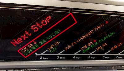 Electronic display showing upcoming stations and which ones are accessible