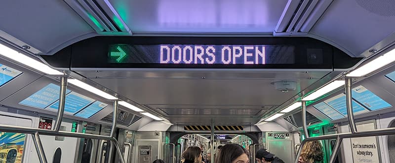 Overhead display showing an arrow on which side the doors will open.